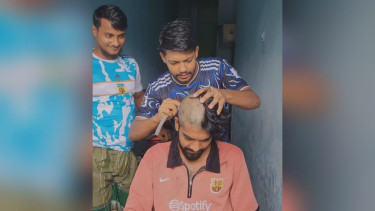 বিশ্বকাপ গ্রুপ পর্বে আর্জেন্টিনা বিজয়ী হওয়ায় মাথা ন্যাড়া করলো ব্রাজিলের সমর্থক