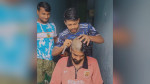 বিশ্বকাপ গ্রুপ পর্বে আর্জেন্টিনা বিজয়ী হওয়ায় মাথা ন্যাড়া করলো ব্রাজিলের সমর্থক